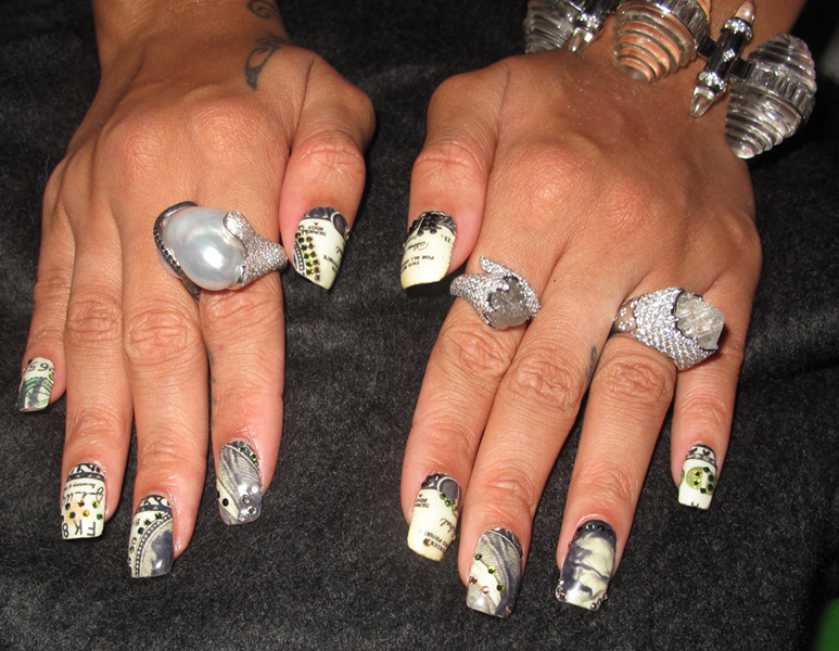 http://www.alllacqueredup.com/wp-content/uploads/2010/02/Rihanna-Nails-Grammys-Money-Minx-Kimmie-Kyees.jpg