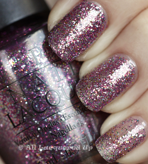 opi-show-it-glow-it-swatch-burlesque-holiday-2010-glitter