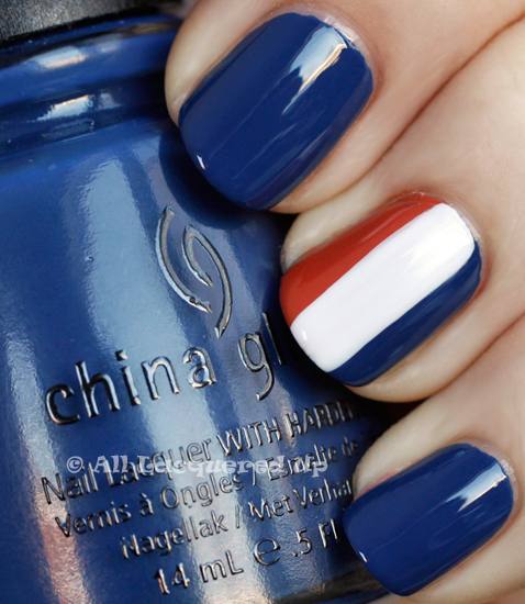 nautical manicure of a signal flag using china glaze first mate, snow and life preserver from the china glaze anchors away collection for spring 2011