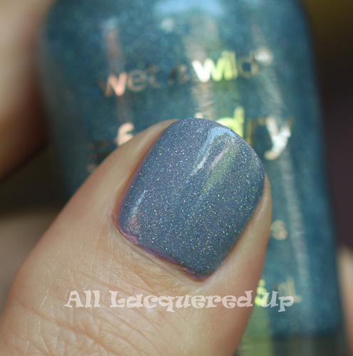 wet n wild blue wants to be a millionaire layered over opi done out in deco swatch wet n wild fastdry nail polish