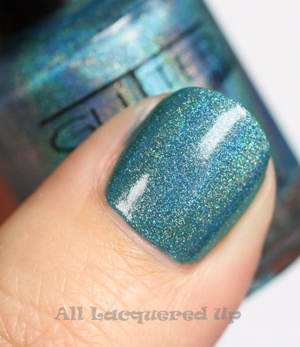 cult nails let me fly nail polish swatch with glitter gal holographic blue layered on top